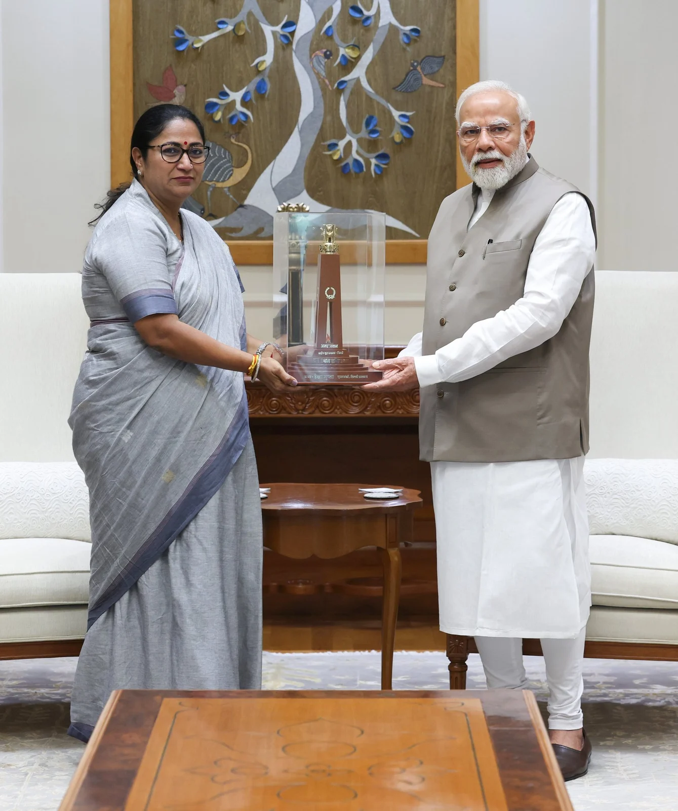 Rekha Gupta in a sari, wearing spectacles