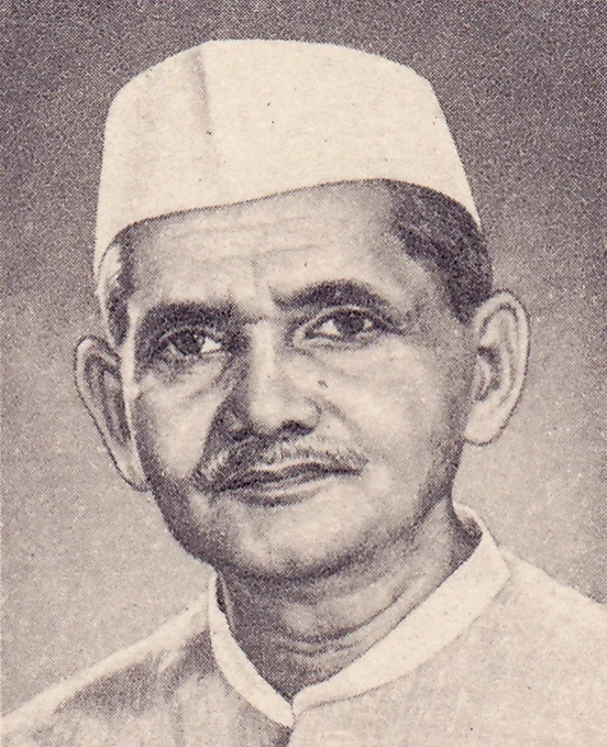 Illustrated portrait of Lal Bahadur Shastri in a white cap