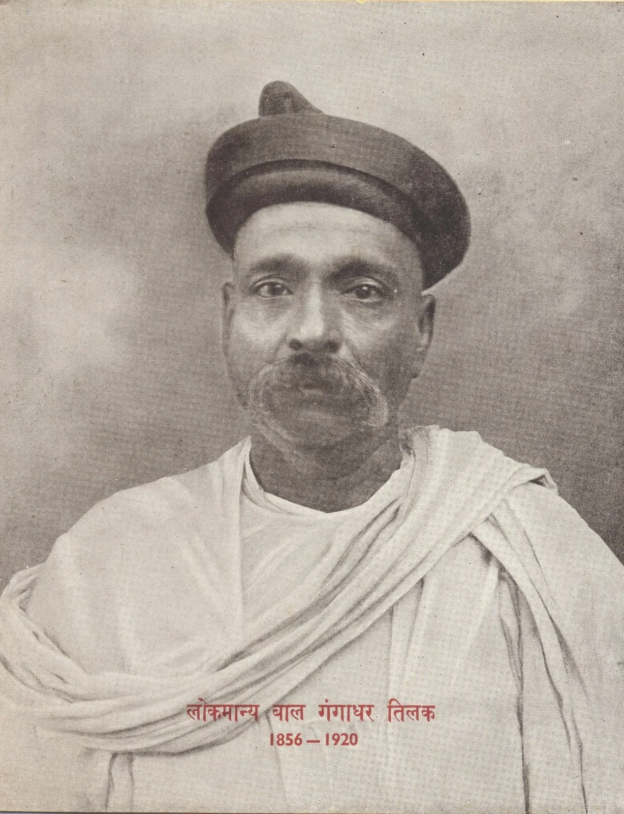 Bal Gangadhar Tilak in a round cap and shawl